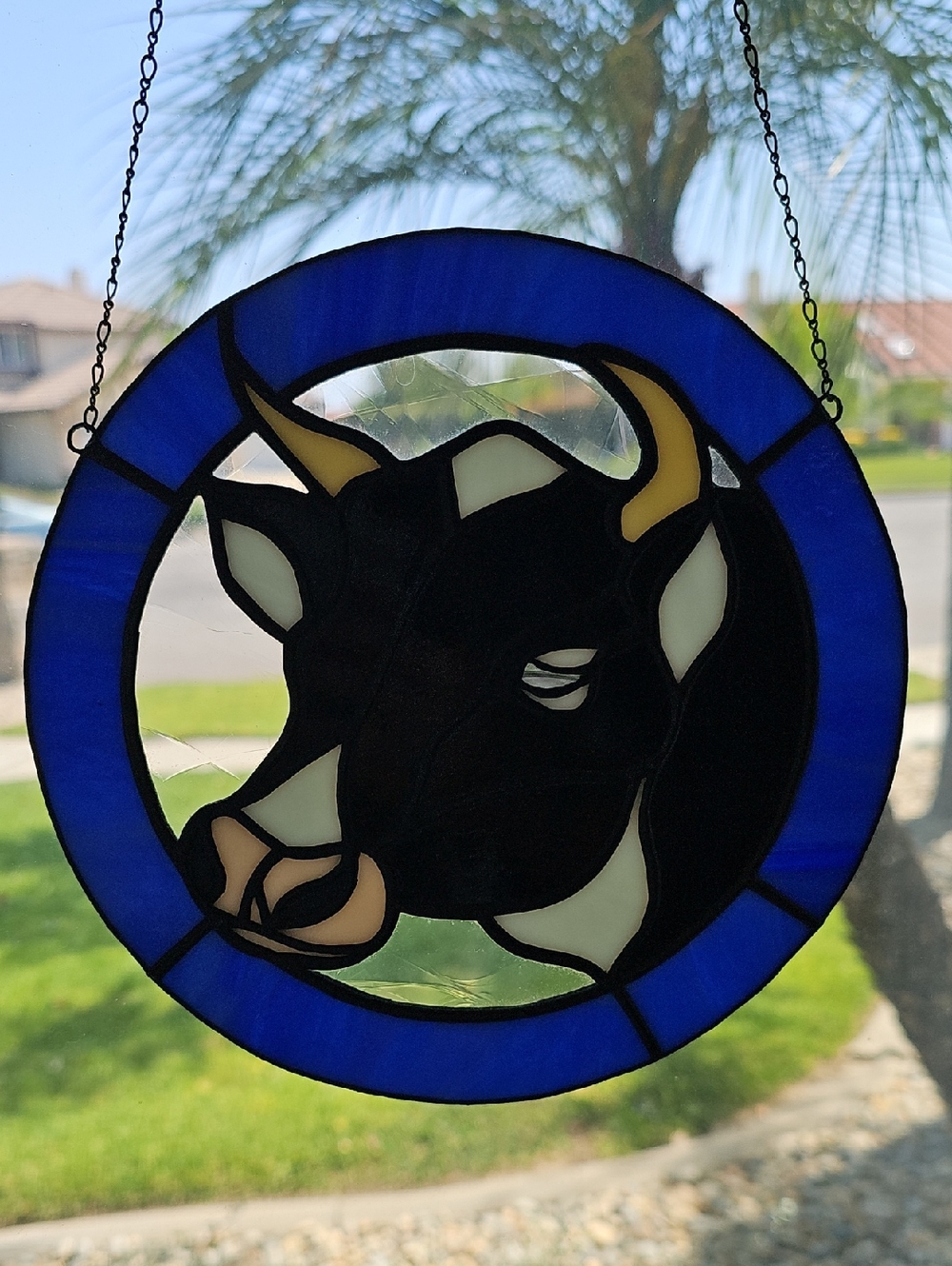 VINTAGE HANDMADE STAINED GLASS BULL SUNCATCHER